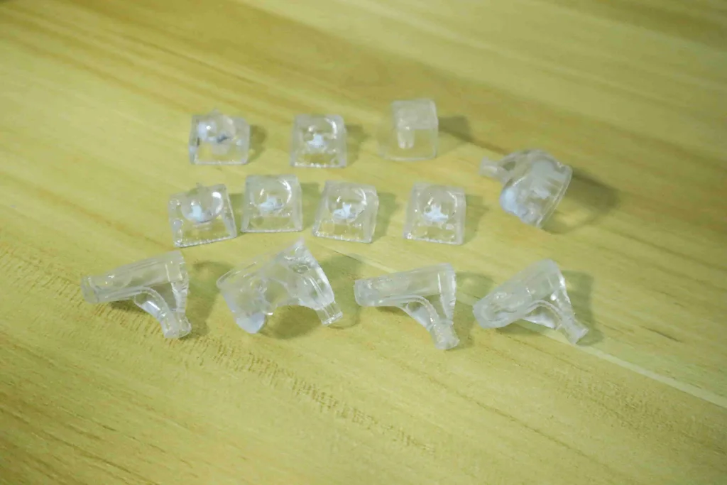 Earphone housings and keycaps printed by PAT10 transparent resin