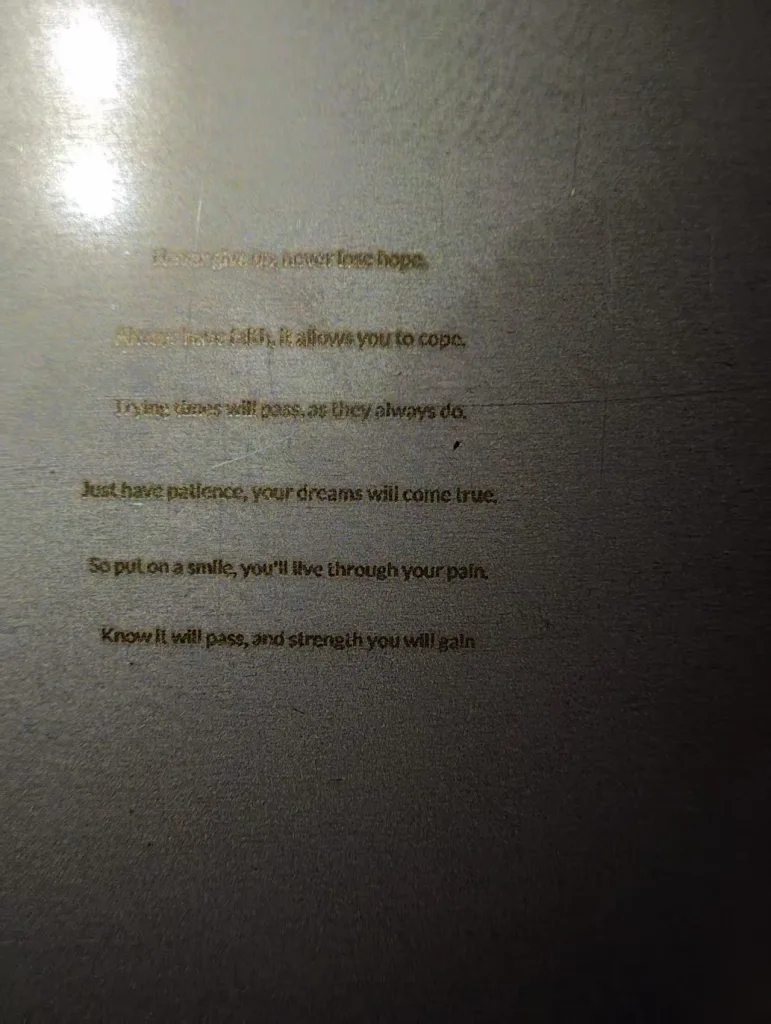English text fully formed under a macro lens.