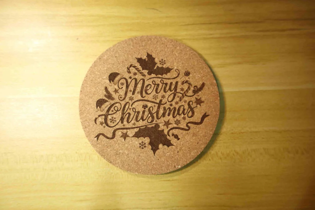 Ultra-fine engraving on cork (AI-created Christmas scene)
