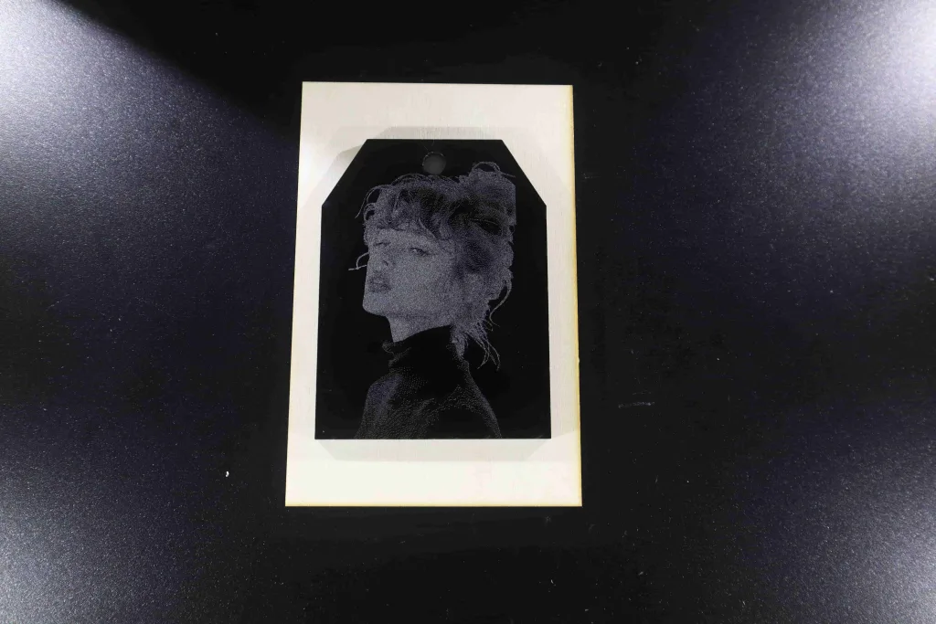 Image engraved on black acrylic with 10W diode laser module